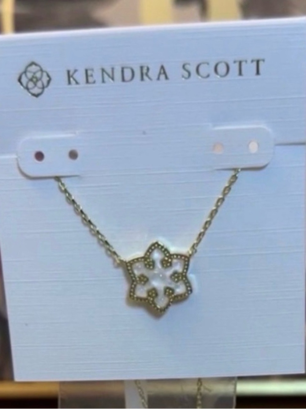 Kendra Scott Gold snowflake Necklace with White Floral Star Pendant
